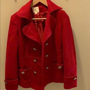 A red double breasted pea coat